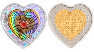 China emite monedas con forma de corazón para celebrar el amor
